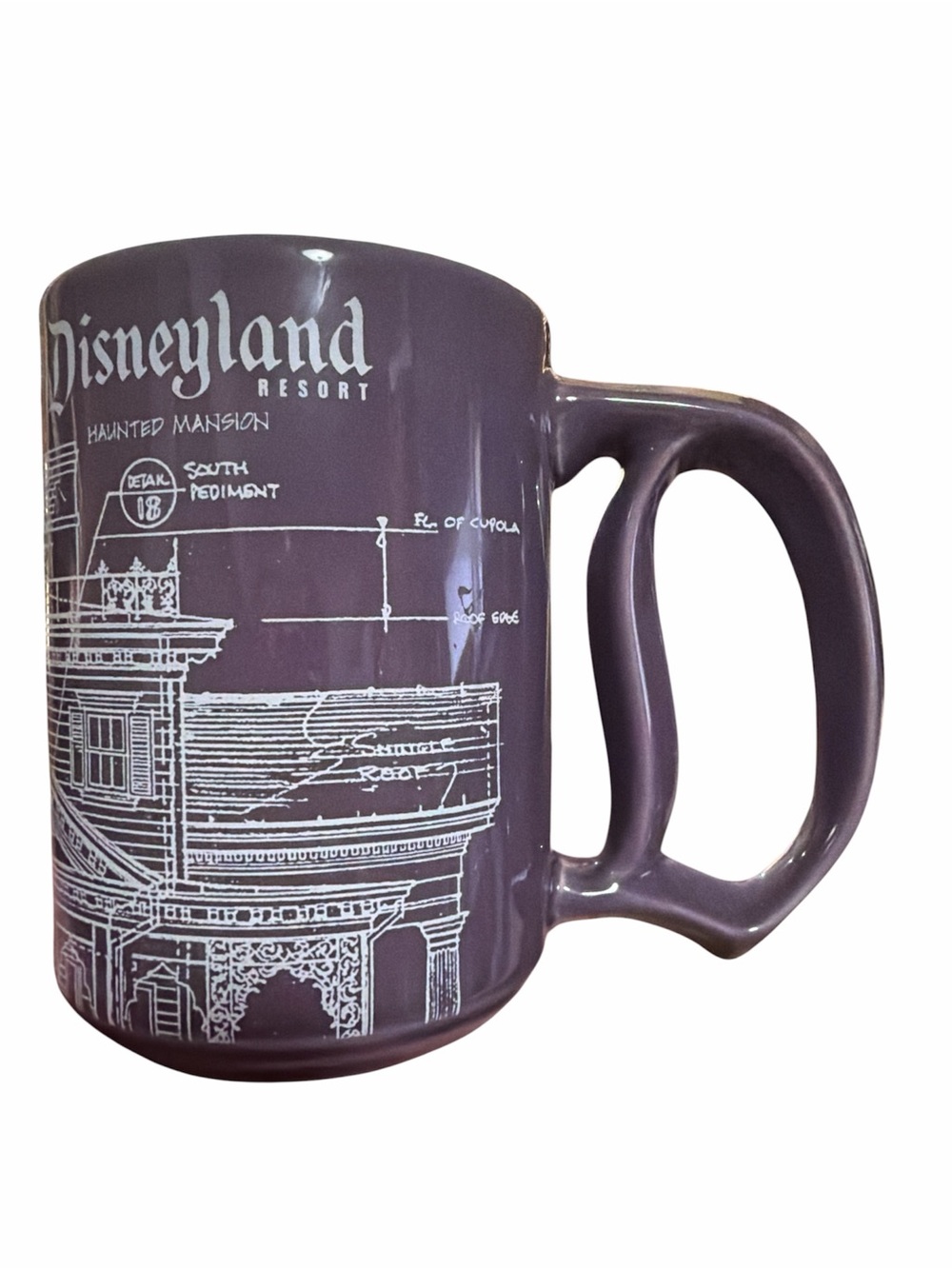Disney Haunted Mansion Ceramic Mug with “D” Handle in Purple and White